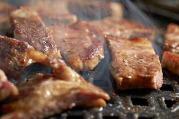 Grilled Pork Shoulder on the grill	