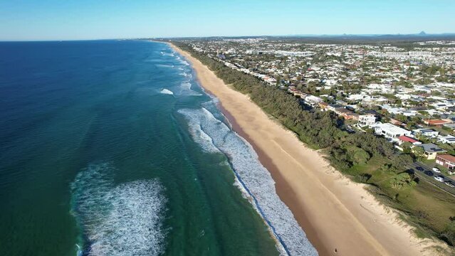 Pullback Flight Above Kawana Beach Near Buddina Foreshore Reserve On Sunshine Coast In Queensland, Australia. aerial