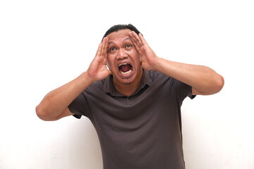 asian man with shocked expression or shocked gesture