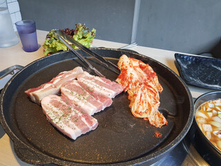 Pork belly on iron plate