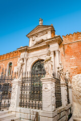 Famous Arsenal, military fortress and church with many statues in historical downtown of Venice,...