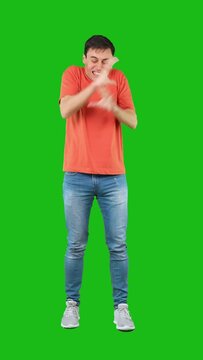 Furious man shouting and gesturing in studio