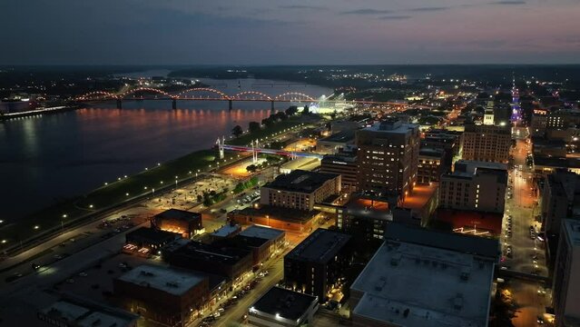 Davenport, Iowa skyline at night with drone video moving left to right.