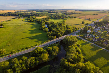 Aerial summer sunny sunset view of nature fields in Lithuania