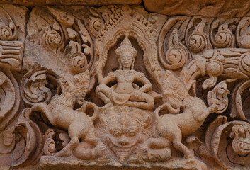 Fototapeta na wymiar Beautiful shiva sculpture on monster lion head of sandstone lintel of Phanom rung castle