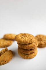 a stack of cookies on a white background macro. a bunch of shortbread cookies close-up.	