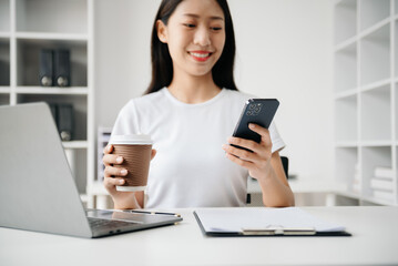 Business woman hands using smartphone and holding credit card sitting. Online Shopping payments  concept.