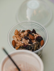 muesli with milk and yoghurt and coffee