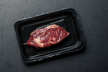 Raw beef ribeye steak