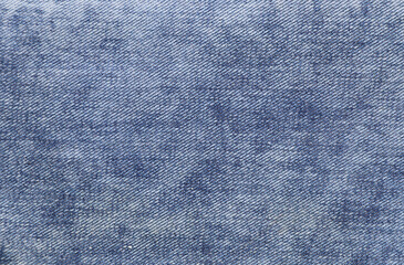 Blue color denim jeans fabric texture. Horizontal or vertical light blue denim background
