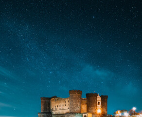 Naples, Italy. Castel Nuovo Often Called Maschio Angioino In Evening Or Night Illuminations.