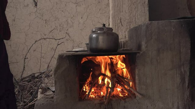 a boiling water in a wood stove
