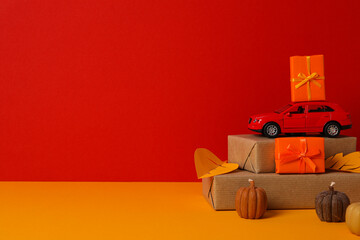 Autumn or fall travel and vacation concept with car