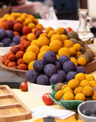 round cheese with colored spices.