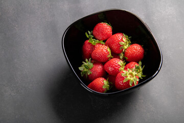 photo of a juicy strawberry in a plate