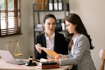 udge gavel with scales of justice, Business and lawyer or counselor consulting and discussing...