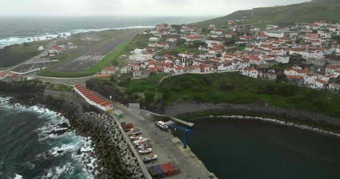 Aerial shots of the town of Corvo island and its aerodrome in the Azores