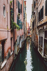 Obraz na płótnie Canvas Venice, Italy a scenic narrow canal