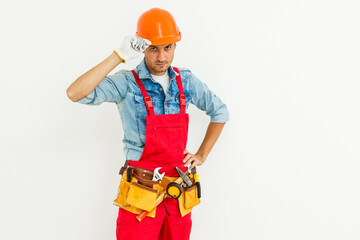 Young construction workers with hard hats on a white background