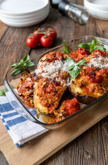 Stuffed eggplant with brown rice, tuna, tomato sauce and grated parmesan cheese.