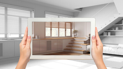 Augmented reality concept. Hand holding tablet with AR application used to simulate furniture products in custom architecture design, black ink sketch, kitchen and living room