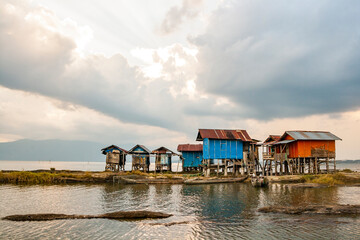 Fototapeta na wymiar Traditional fisherman house in the beautiful lake