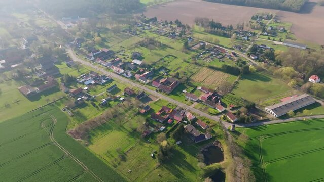 A litte village in the countryside. Drone move forward