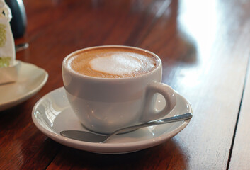 Hot latte in a warm atmosphere
