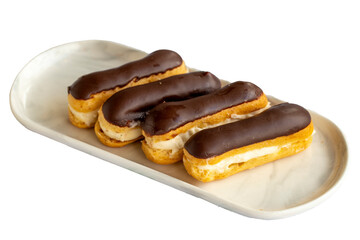 Chocolate eclair cake isolated on white background. Bakery products. close up