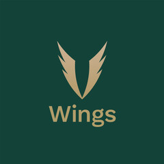luxury golden wing logo on green background.