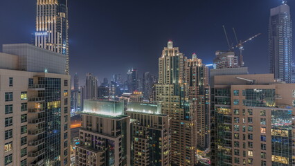 Fototapeta na wymiar Panorama of downtown Dubai city aerial night timelapse