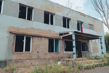 Administrative building damaged by shelling. War in Ukraine