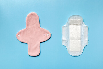 set of colorful bright reusable menstrual pads. zero waste woman periods concept top view with copy space © sosiukin