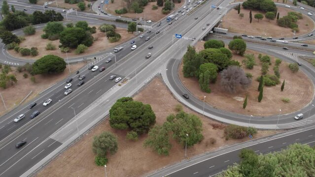 Traffic navigates through cloverleaf interchange