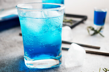 A glass of cocktail, Blue Lagoon. cool. on a gray background