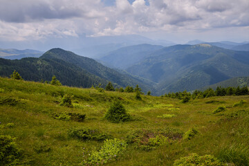 Fototapeta na wymiar Beautiful mountains landscape in summer. Carpathians mountains in Romania. Baiului Mountains trails.
