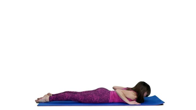 Girl in pink sportswear exercising lying on fitness mat, Full HD footage with alpha transparency channel isolated on white background 