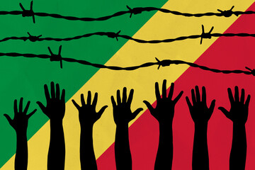 Republic of the Congo flag behind barbed wire fence. Group of people hands. Freedom and propaganda concept