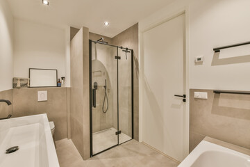 a modern bathroom with shower, toilet and bathtub in the background is an open door to a walk - in...