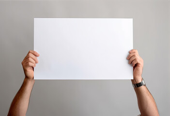 hands are holding a blank sheet of paper with a white background - 624345885