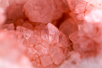 artificially pink dyed quartz geode detail.  macro detail texture background. close-up raw rough unpolished semi-precious gemstone