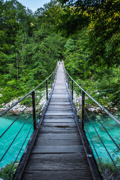 Suspension bridge in Soca valley over Soca river in Slovenia © marcin jucha