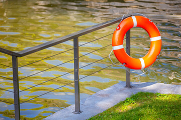 red lifebuoy on the pier without people. 