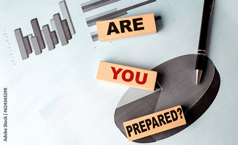 Poster are you prepared text on wooden block on chart background
