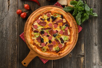 Delicious crunchy edge delicatessen pizza with vegetables