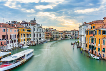 Long exposure picture with the Grand Canal at sunset in Venice, Italy.