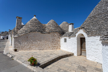 Fototapeta na wymiar The Trulli of Alberobello, the typical limestone houses in the province of Bari, Puglia, Italy
