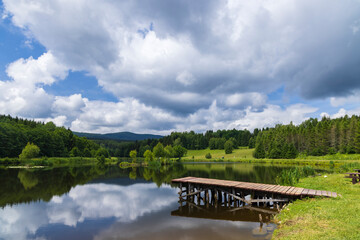 Fototapeta na wymiar Pond near Poniatow Rudawa, Orlicke mountains, Okres Kladzko, Poland