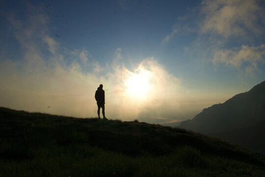 silhouette of a person in the mountains, Tiganesti Mountain, Bucegi Mountains, Romania 
