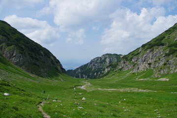 Fototapeta na wymiar landscape with sky, Ciubotea Valley, Bucegi Mountains, Romania 